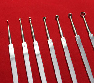 Buck Ear Curette Set of 7 Piece Sharp Point Flate handle overall length 6.5"