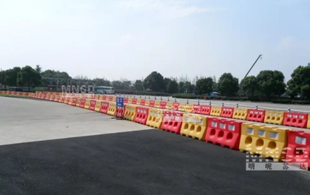 Water filled road barrier