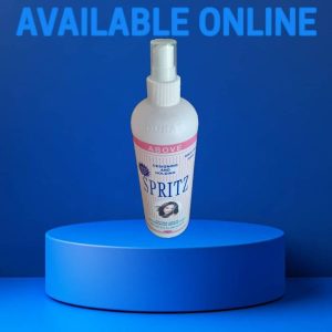 Above spritz for hodolding and designing hair cream